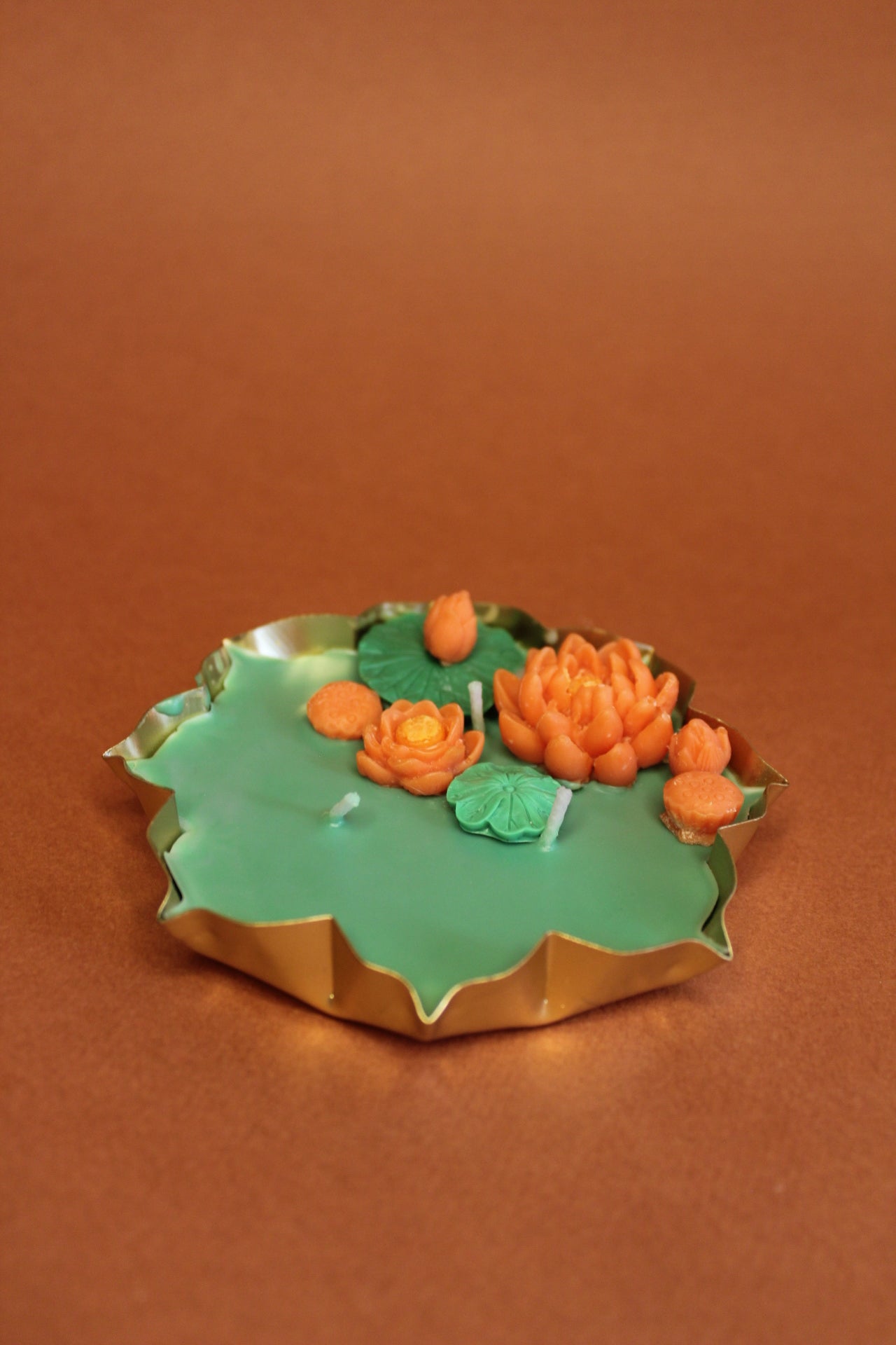 Orange flower Urli Lotus Pond Candle – A Floral Festive Delight